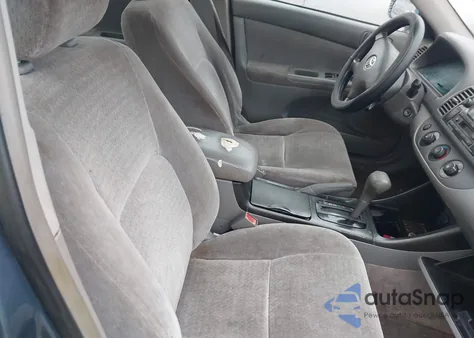 2003 Toyota Camry Le z USA, uszkodzony, nr VIN JTDBE32K030236131